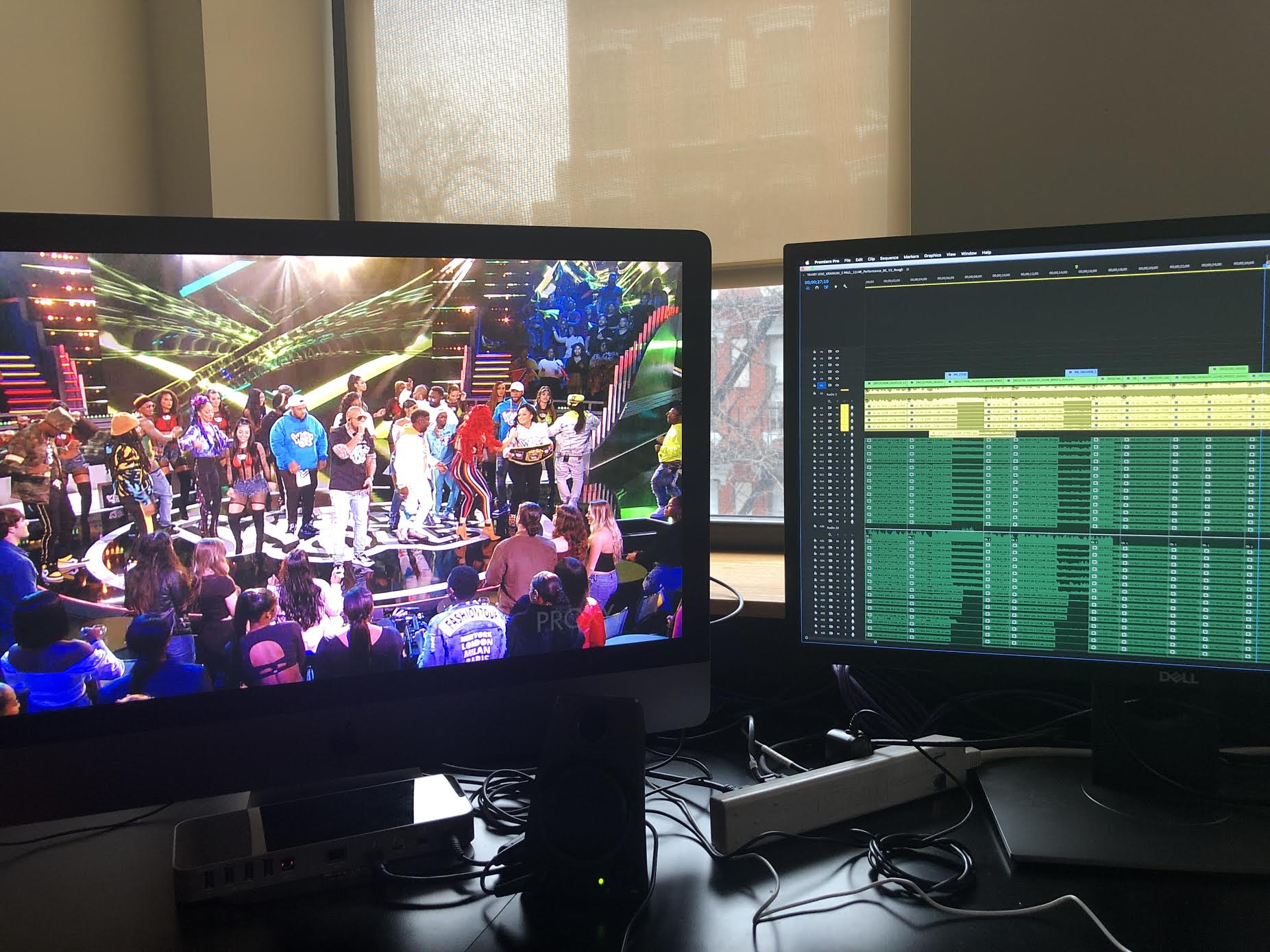 Two monitors on table